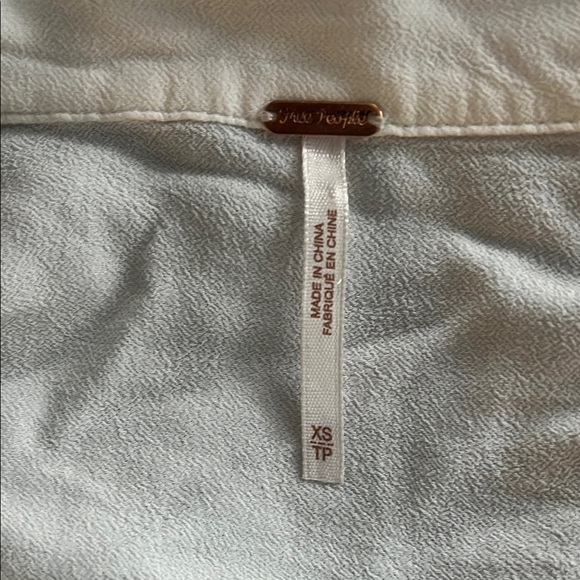 Stylish White Ruffled Top - Picture 5 of 5